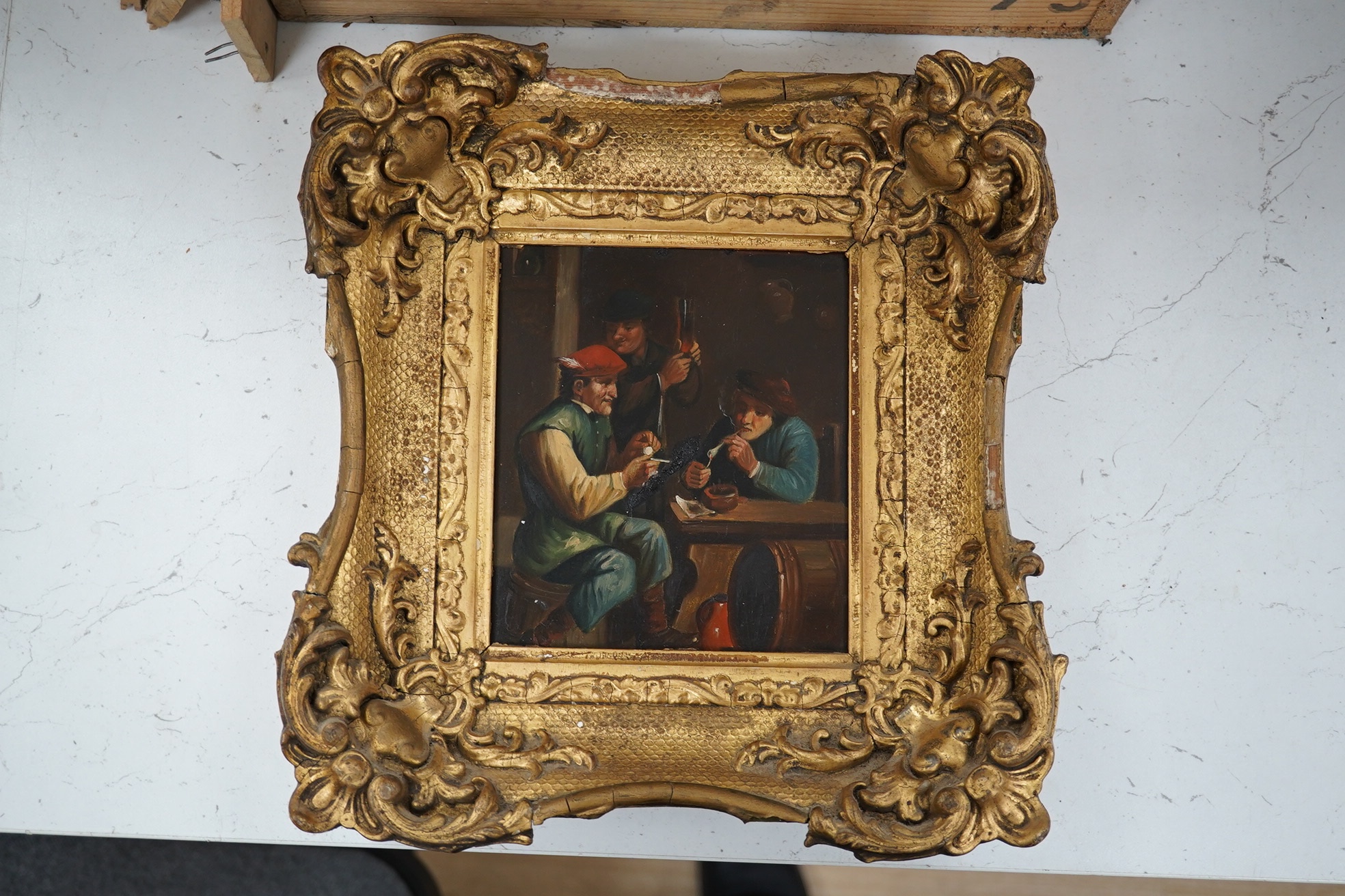 A 19th century, Flemish School, oil on copper, Tavern scene with figures smoking, 15 x 13cm, ornate gilt framed. Condition - poor to fair
